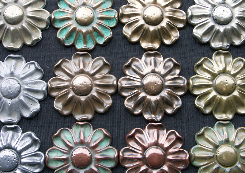 Flower home decor coated with liquid metals.